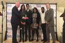 Newham youth group New Choices for Youth are presented with their award by Sir Mike Penning MP