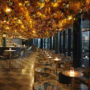 The 11th floor rooftop bar has been given a festive makeover this year, complete with twinkling fairy lights and hundreds of baubles embedded in its floral ceiling.